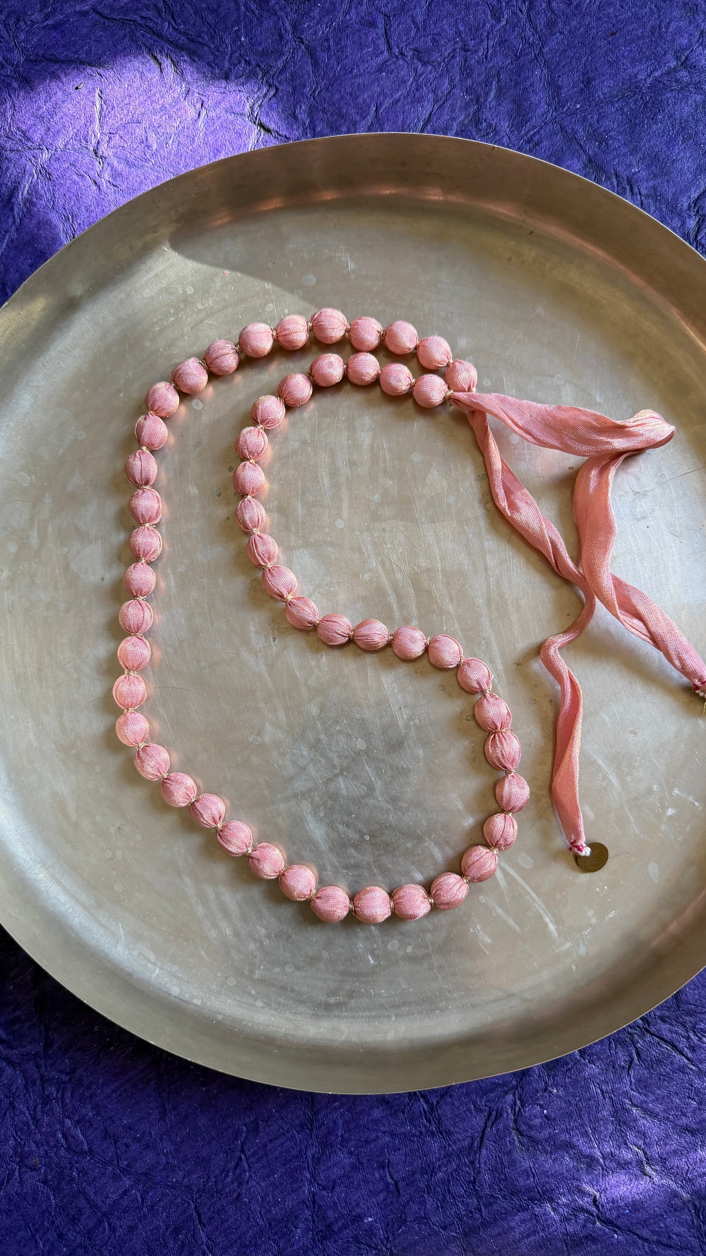 Light gulabi mala