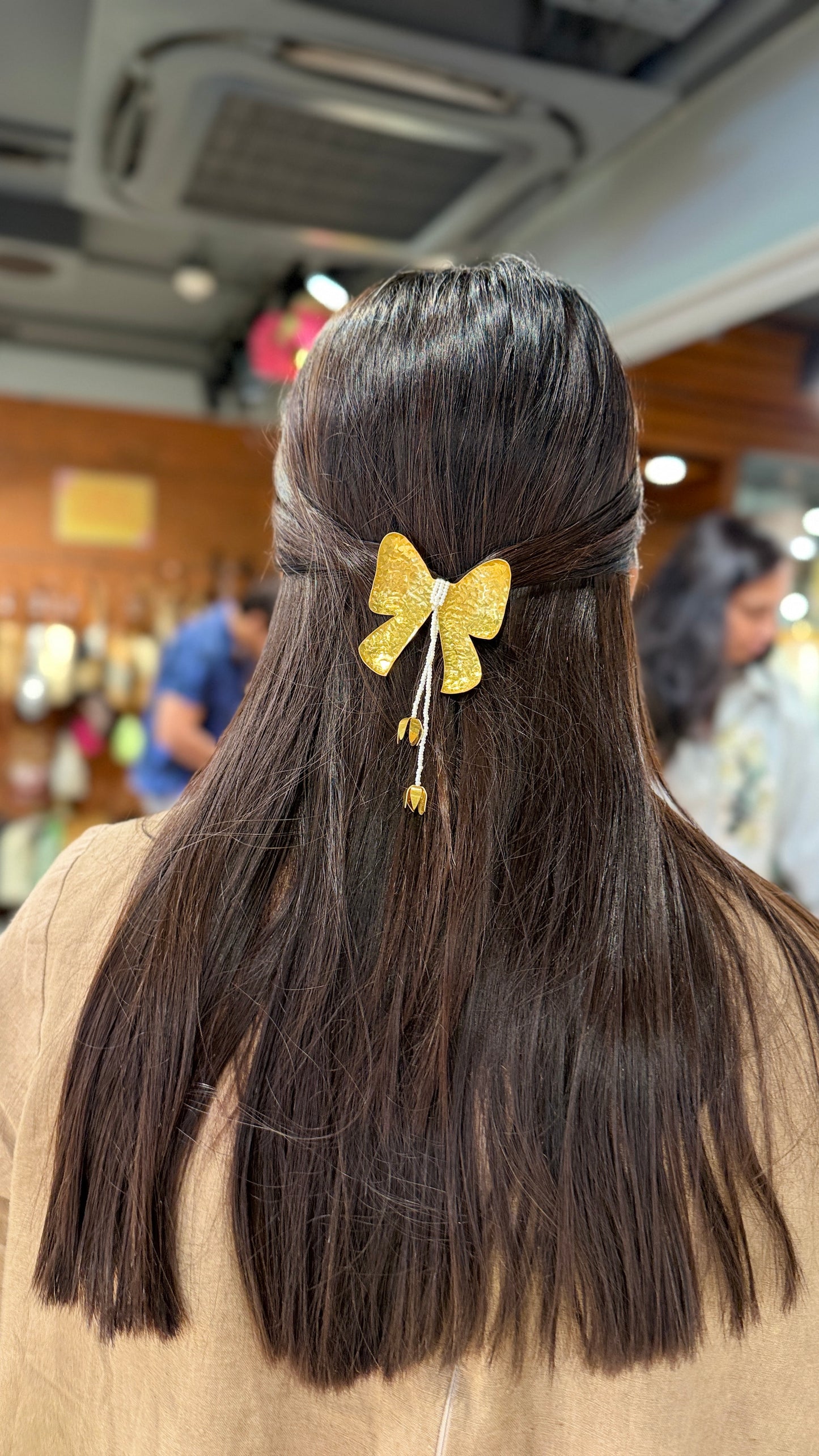 Brass tail Bow