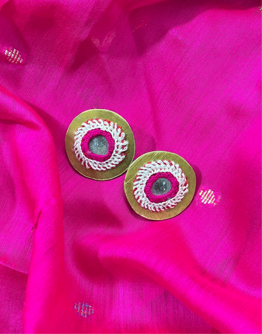 pink round brass stud