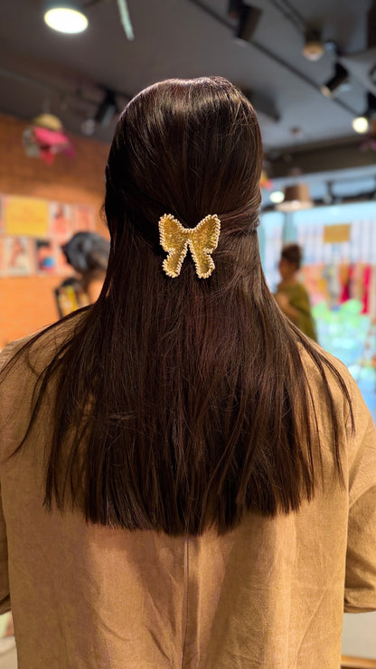 Brass pearl Bow