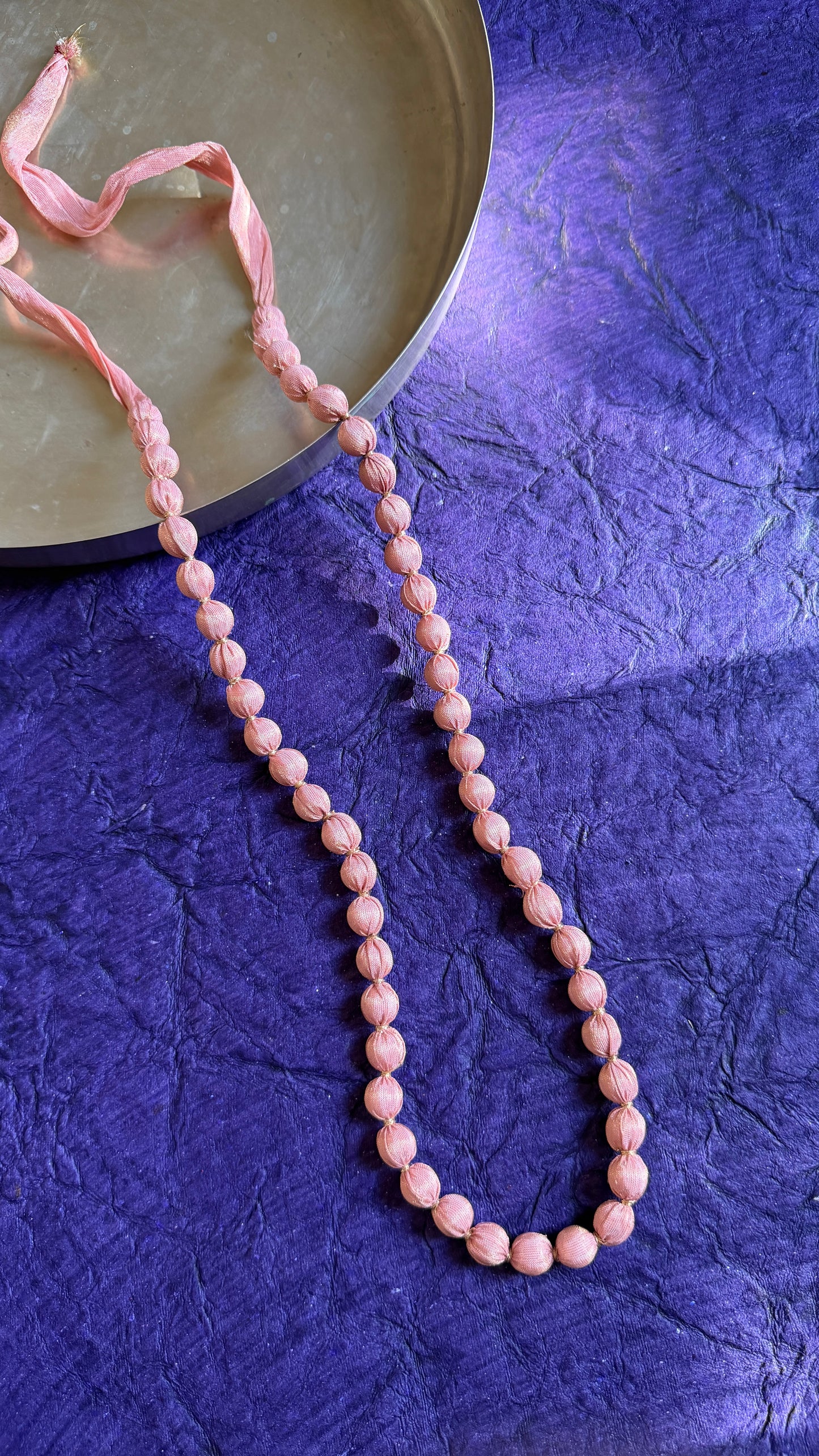 Light gulabi mala