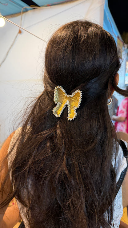 Brass pearl Bow