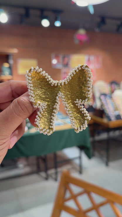 Brass pearl Bow